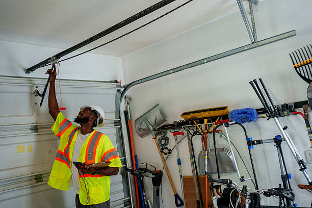 Professional Garage Door Panel Replacement technician working in Poteau, OK