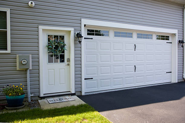 24/7 Emergency Garage Door Panel Replacement experts in Poteau, OK